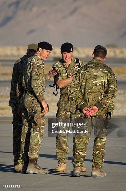 Prince Harry arrives to meet British troops and service personal still remaining in Afghanistan at Kandahar Airfield November 9, 2014 in Kandahar,...