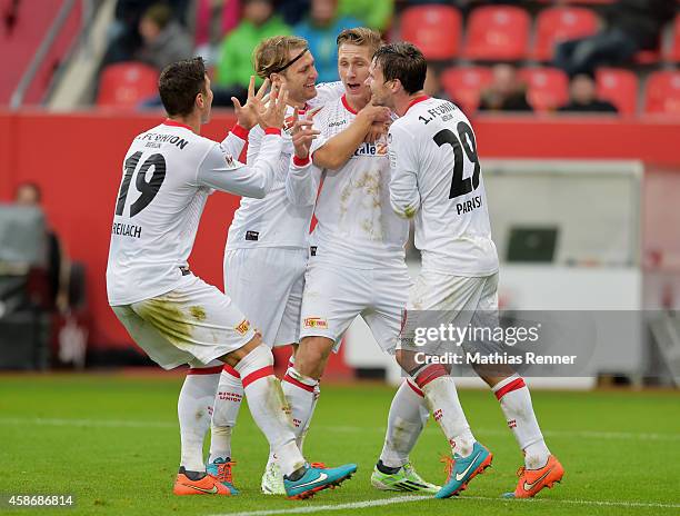 Damir Kreilach, Martin Dausch, Sebastian Polter and Michael Parensen of 1 FC Union Berlin celebrate after scoring the 2:3 during the game between FC...