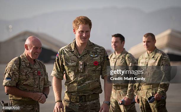 Prince Harry meets with British service personel following a Remembrance Sunday service at Kandahar Airfield November 9, 2014 in Kandahar,...