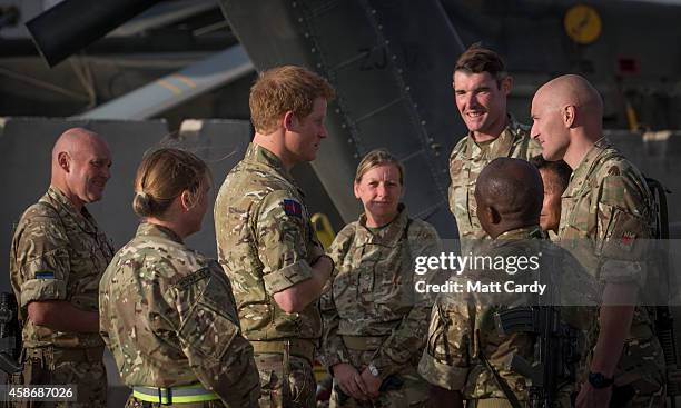 Prince Harry meets with British service personel following a Remembrance Sunday service at Kandahar Airfield November 9, 2014 in Kandahar,...