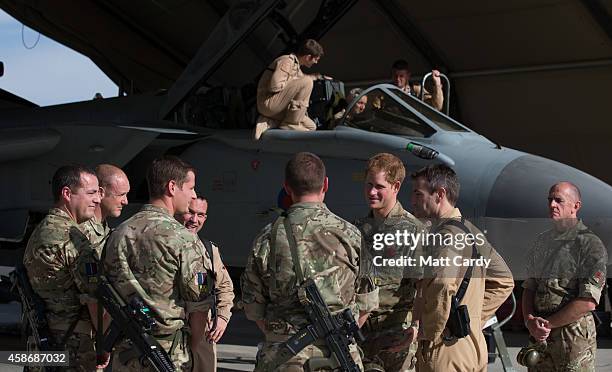 Prince Harry meets pilots and ground crew of a RAF Tornado following a Remembrance Sunday service at Kandahar Airfield November 9, 2014 in Kandahar,...