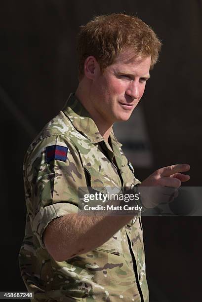 Prince Harry meets pilots and ground crew of a RAF Tornado following a Remembrance Sunday service at Kandahar Airfield November 9, 2014 in Kandahar,...
