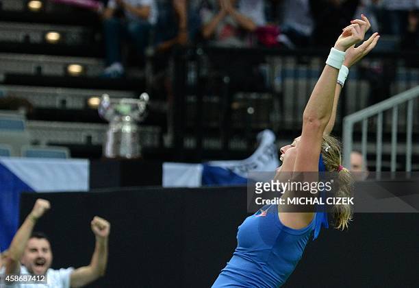 Petra Kvitova of Czech Republic celebrates after defeating Angelique Kerber of Germany during the International Tennis Federation Fed Cup final match...