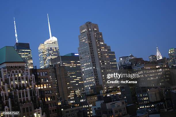 new york skyline at night - chrysler building stock pictures, royalty-free photos & images