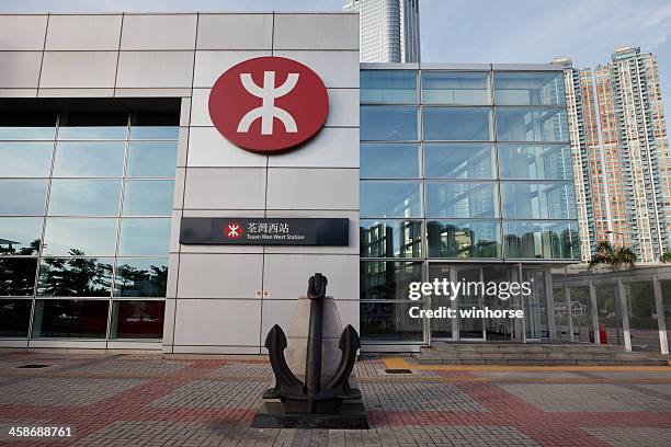 mass transit rail (mtr) station in hong kong - mtr logo stock pictures, royalty-free photos & images