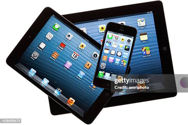 new apple iphone 5 with ipad 4 and mini - animal retina stock pictures, royalty-free photos & images