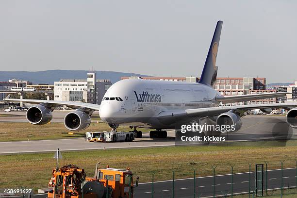 airbus a380 towed across the airfield - airport frankfurt stock pictures, royalty-free photos & images