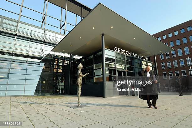 judge or lawyer leaving courthouse in utrecht - courthouse bildbanksfoton och bilder