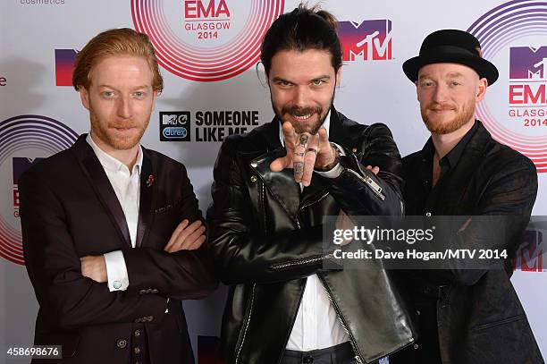 Ben Johnston, Simon Neil and James Johnston of Biffy Clyro attend the MTV EMA's 2014 at The Hydro on November 9, 2014 in Glasgow, Scotland.