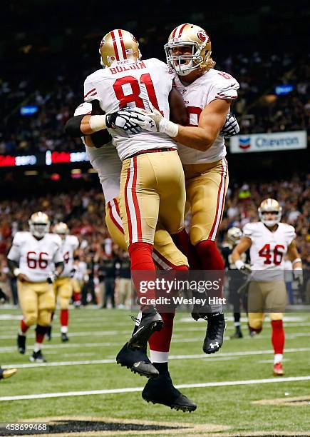 Anquan Boldin of the San Francisco 49ers celebrates a touchdown with Vance McDonald during the second quarter of a game against the New Orleans...