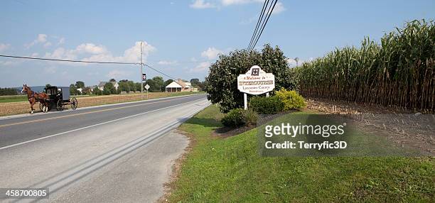 buggy and sign for intercourse, pa - terryfic3d stock pictures, royalty-free photos & images