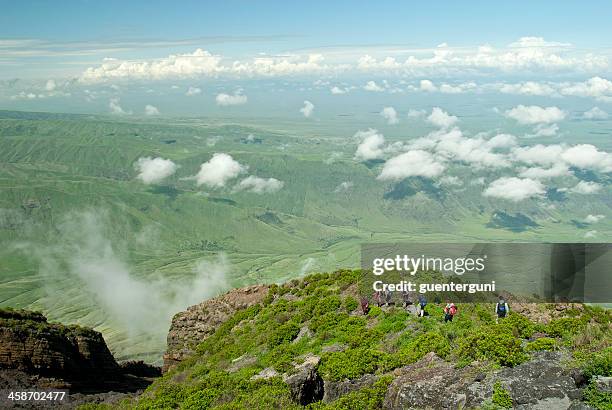 hiking down from ol doinyo lengai into the rift valley - ol doinyo lengai stock pictures, royalty-free photos & images