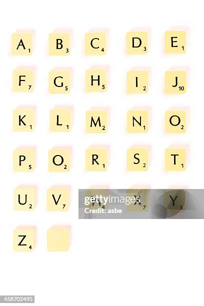 scrabble letters alphabet - scrabble board stock pictures, royalty-free photos & images