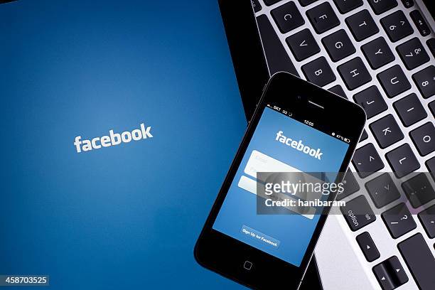 facebook on digital tablet - social media stock pictures, royalty-free photos & images