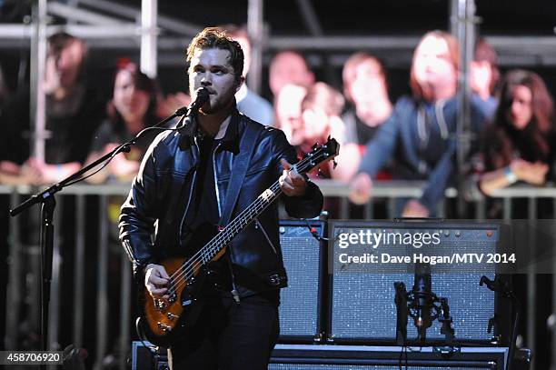 Mike Kerr of Royal Blood performs on stage during the MTV EMA's 2014 at The Hydro on November 9, 2014 in Glasgow, Scotland.