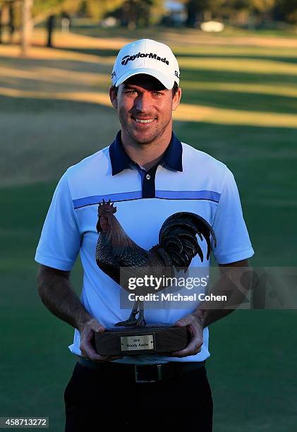 Nick Taylor of Canada is presented with the trophy after winning the Final Round of the Sanderson Farms Championship at The Country Club of Jackson...