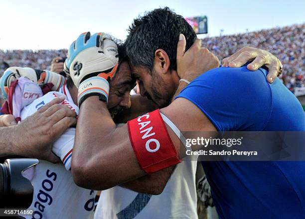 Alvaro Recoba and Gustavo Munua of Nacional celebrate after winning a match between Nacional and Peñarol as part of round 12th of Campeonato Apertura...