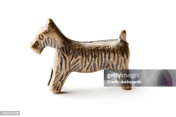 Monopoly Scottie Dog Game Piece High-Res Stock Photo - Getty Images