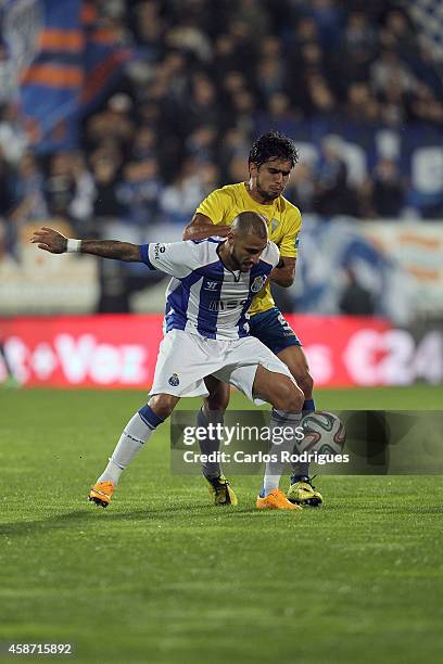 Porto's midfielder Quaresma tries to escape Estoril's defender Anderson Luis during the Portuguese First League match between GD Estoril Praia and FC...