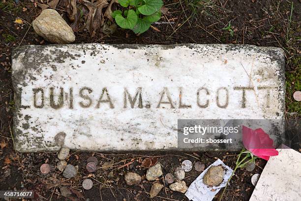 grave of louisa may alcott - concord massachusetts stock pictures, royalty-free photos & images