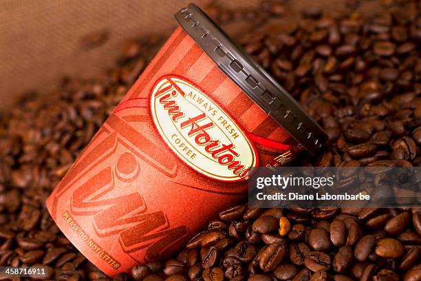 take-out tim hortons  coffee cup - tim hortons stock pictures, royalty-free photos & images