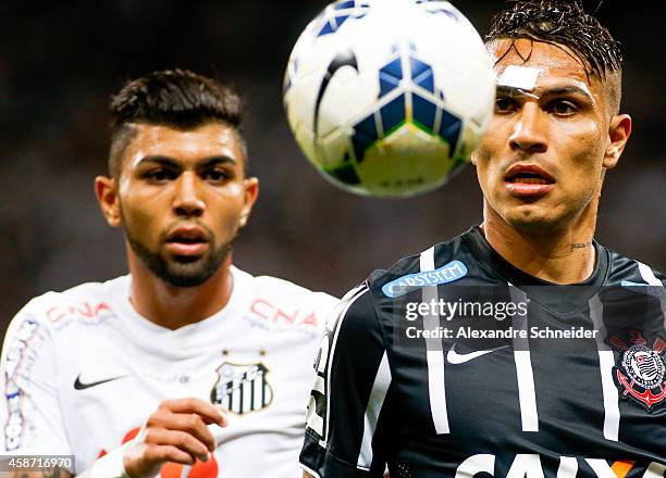 Guerrero of Corinthians and Gabriel of Santos in action during the match between Corinthians and Santos for the Brazilian Series A 2014 at Arena...