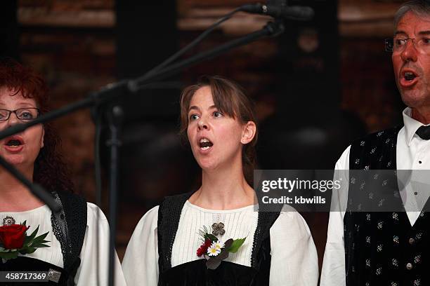 swiss yodel choir sing at festival - yodeling woman stock pictures, royalty-free photos & images