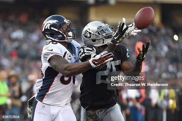 Hayden of the Oakland Raiders cannot complete the reception against the defense of Demaryius Thomas of the Denver Broncos in the third quarter at...