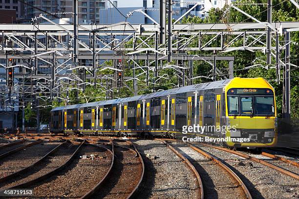 waratah commuter train departs sydney central station - sydney train stock pictures, royalty-free photos & images