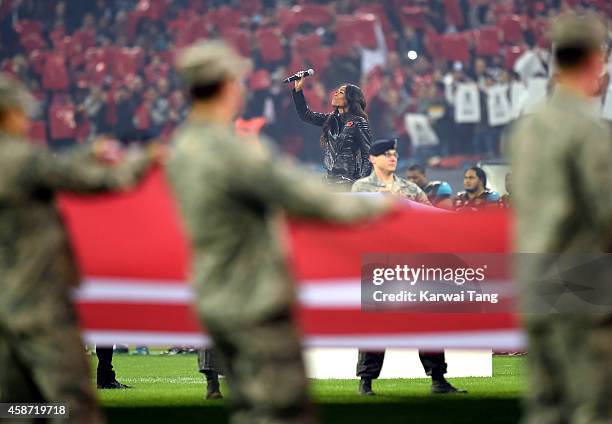 Michelle Williams attends as the Dallas Cowboys play the Jacksonville Jaguars in an NFL match at Wembley Stadium on November 9, 2014 in London,...