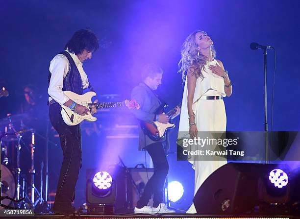 Joss Stone and Jeff Beck perform prior to the Dallas Cowboys versus Jacksonville Jaguars NFL match at Wembley Stadium on November 9, 2014 in London,...