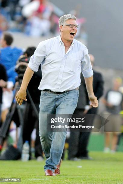 Alvaro Gutierrez, head coach of Nacional, celebrates the second goal of his team during a match between Nacional and Pe±arol as part of round 12th of...