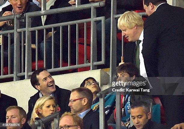 George Osborne and Boris Johnson attend as the Dallas Cowboys play the Jacksonville Jaguars in an NFL match at Wembley Stadium on November 9, 2014 in...