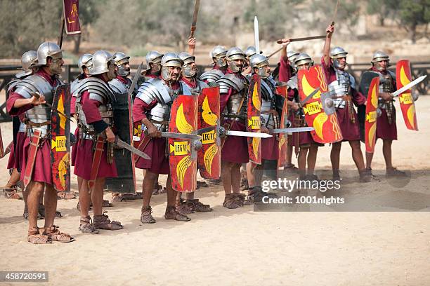 legion attacking - jerash, jordan - jordan coat of arms stock pictures, royalty-free photos & images