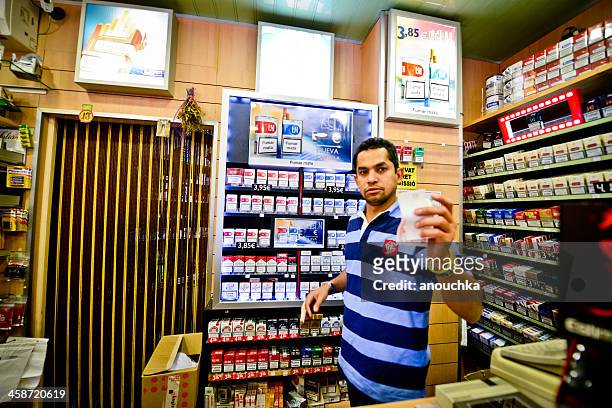 cigarettes vendor, barcelona, spain - buying cigarettes stock pictures, royalty-free photos & images