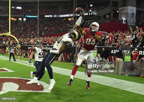 Cornerback E.J. Gaines of the St. Louis Rams knocks the football away from tight end Rob Housler of the Arizona Cardinals in the third quarter of the...