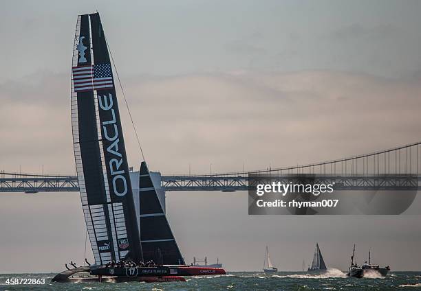 oracle boat of americas cup race in san francisco - yachting race stock pictures, royalty-free photos & images