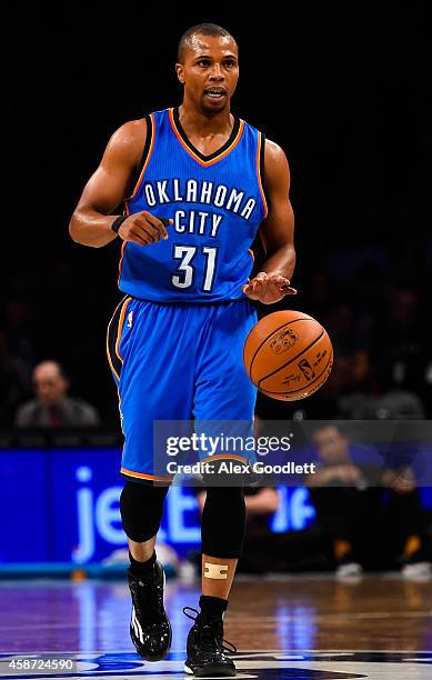 Sebastian Telfair of the Oklahoma City Thunder in action during a game against the Brooklyn Nets at the Barclays Center on November 3, 2014 in the...