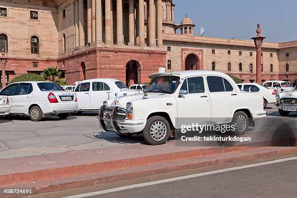 traditional official government car called ambasador at new delhi india - ambassador car stock pictures, royalty-free photos & images