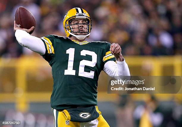 Quarterback Aaron Rodgers of the Green Bay Packers throws 73 yards for a touchdown against the Chicago Bears in the second quarter at Lambeau Field...