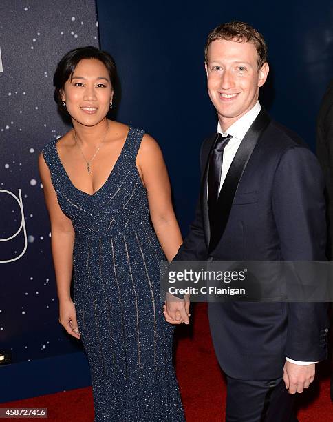 Priscilla Chan and Mark Zuckerberg attend the 2014 Breakthrough Prize Awards at NASA AMES Research Center on November 9, 2014 in Mountain View,...