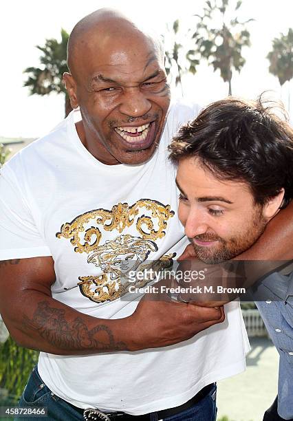 Mike Tyson and director Bert Marcus attend The 2014 American Film Market at the Loews Santa Monica Beach Hotel on November 9, 2014 in Santa Monica,...