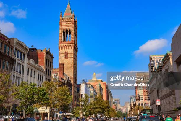 boston, ma usa - looking down a busy boylston street in boston towards copley square on a bright september afternoon; the bell tower of the old south church is seen to the left of the image - boylston street stockfoto's en -beelden