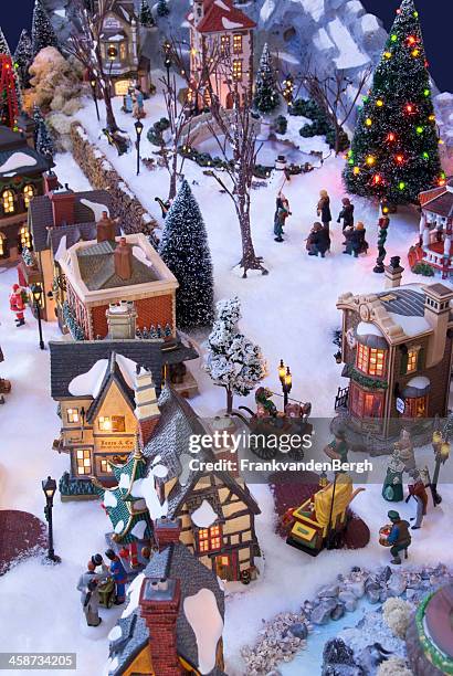 decorative christmas village with charles dickens theme - charles dickens stock pictures, royalty-free photos & images