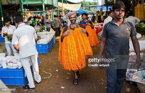flower vendor - flower stall stock pictures, royalty-free photos & images