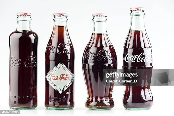 coca-cola anniversary vintage collection - cola bottle stock pictures, royalty-free photos & images