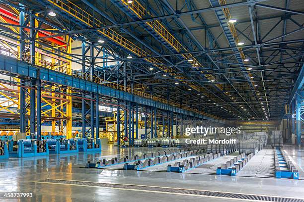 steel mill interior view - iron roll stockfoto's en -beelden