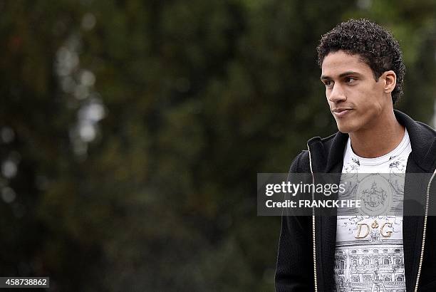 France defender Raphael Varane arrives on November 10, 2014 at the French national football team training base in Clairefontaine on the first day of...