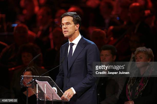 Prime Minister of the Netherlands Mark Rutte speaks as relatives and friends of the victims of the Malaysia Airlines Flight 17 disaster attend a...