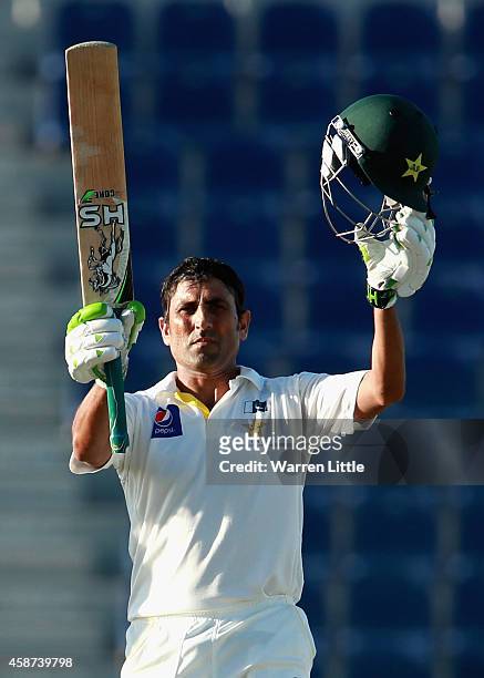 Younis Khan of Pakistan acknowledges the crowd after reaching his century during day two of the first test between Pakistan and New Zealand at Sheikh...